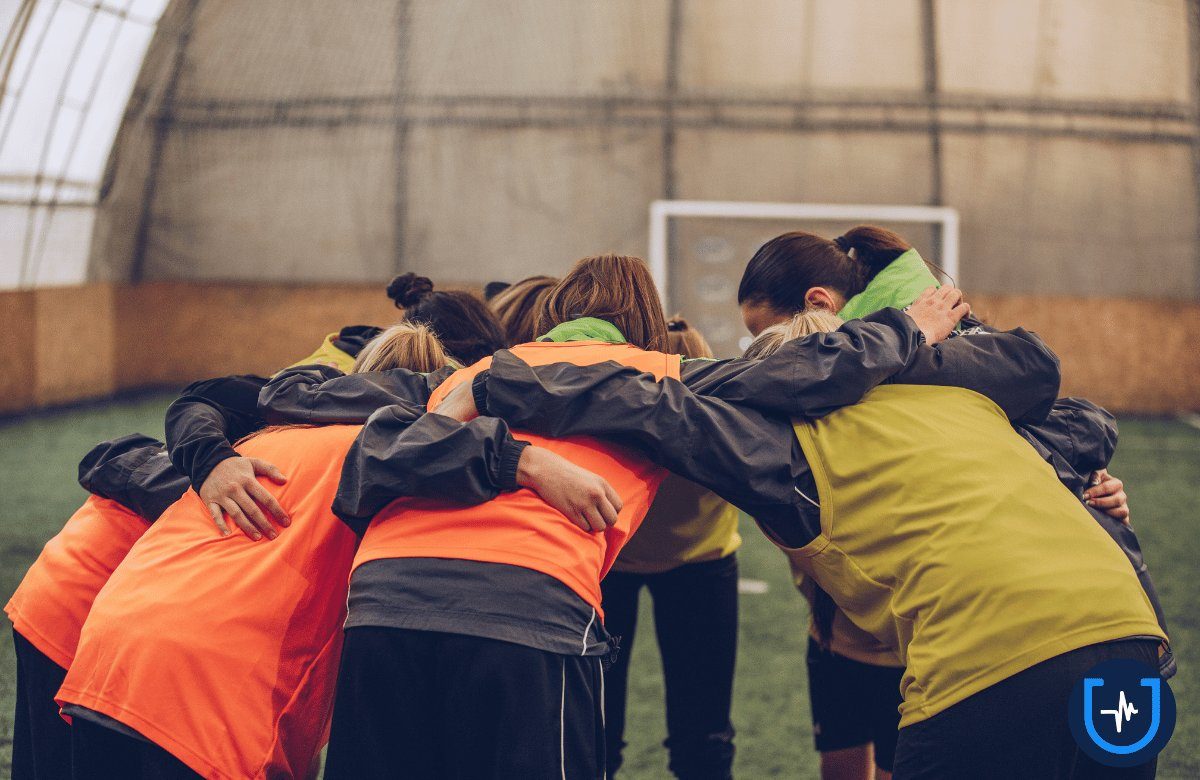 Chicos de un equipo en ronda
